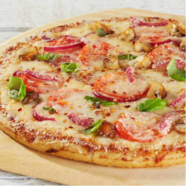 Pizza Topped with Tomatoes and other ingredients