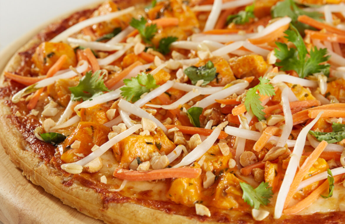 Pizza Topped with Chicken and Sriracha