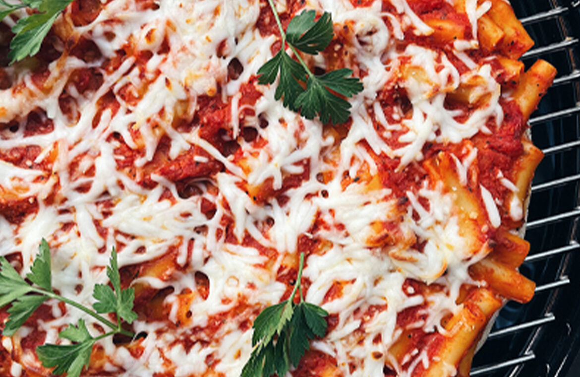 Pizza topped with pasta