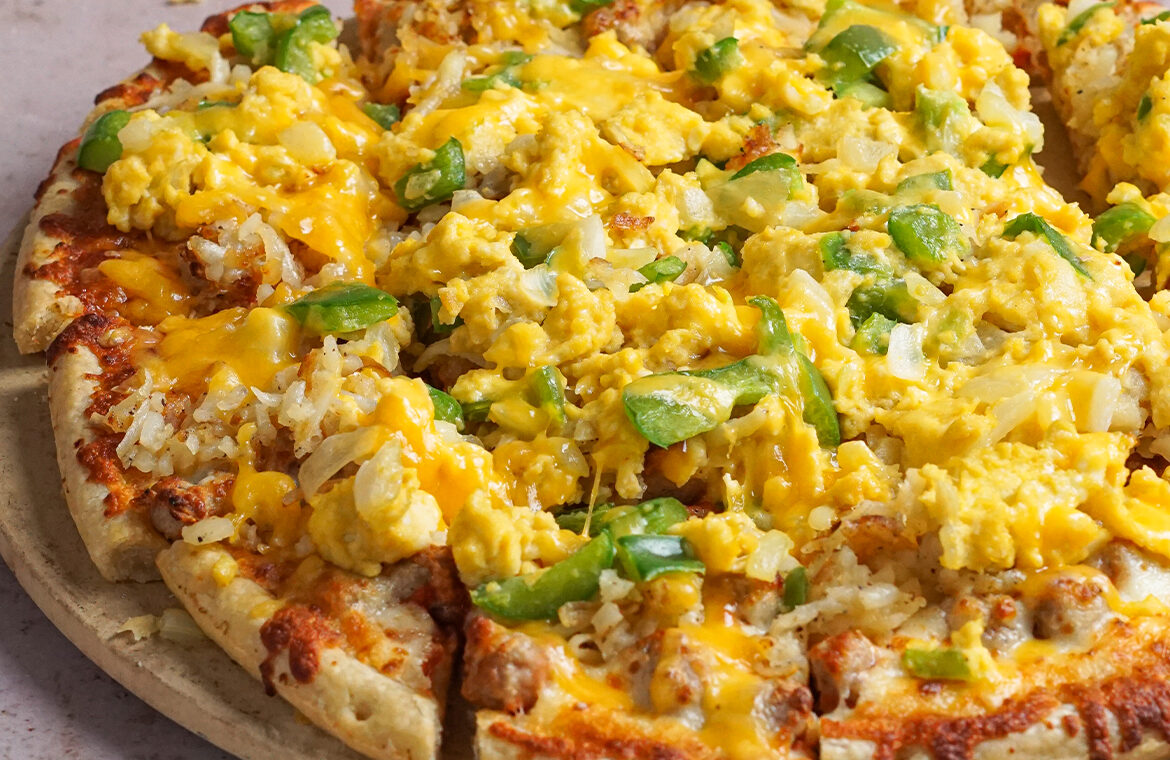 Pizza topped with egg scramble