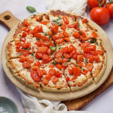 Pizza topped with bruschetta