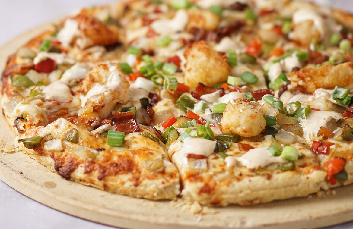 Veggie pizza topped with cheese curds