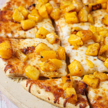 Pizza topped with roasted butternut squash