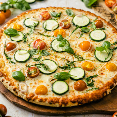 Pizza topped with vegetables