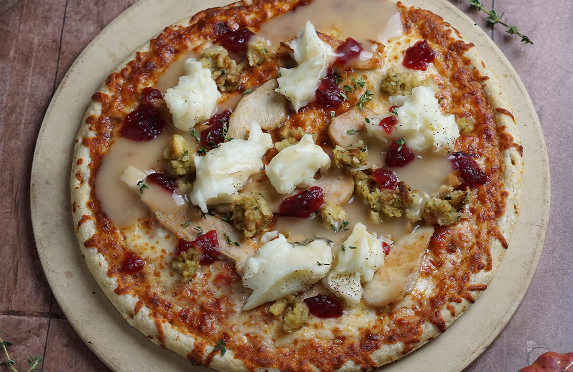 Pizza topped with thanksgiving food leftovers
