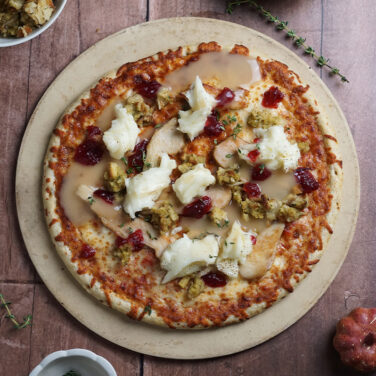 Pizza topped with thanksgiving food leftovers