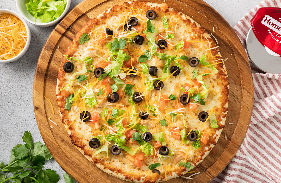 pizza topped with taco ingredients