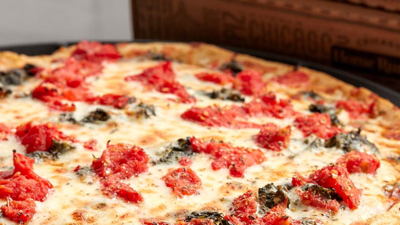 Laura's Favorite Pizza - plum tomatoes, spinach and garlic butter crust