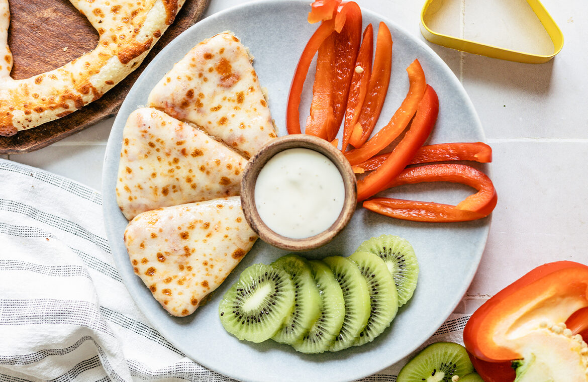 Pizza cut into snack triangles with triangle cookie cutter
