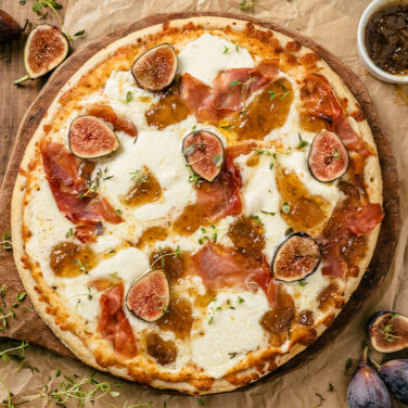 pizza topped with fig jam, mascarpone, and more