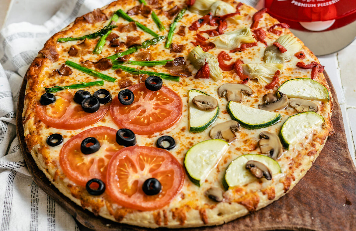 Pizza with different toppings in each quadrant