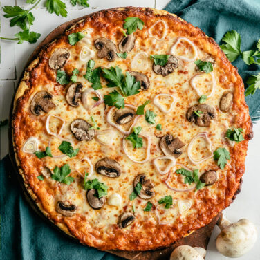 Pizza baked with mushrooms, shallots, and parsley