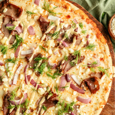 Pizza topped with gyro