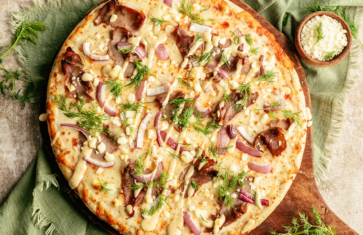 Pizza topped with gyro