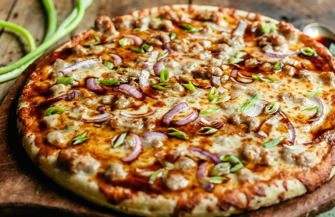 Baked pizza topped with Japanese BBQ and more