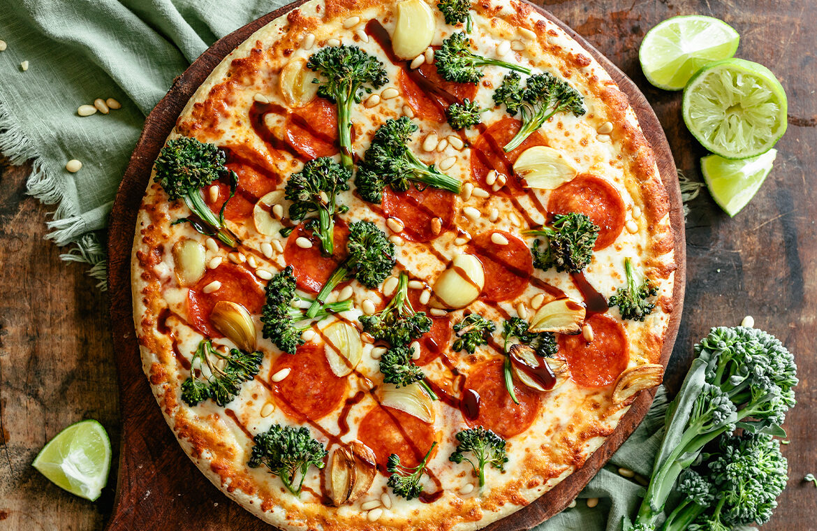 Baked Pepperoni Pizza topped with Broccolini, garlic, and soy glaze