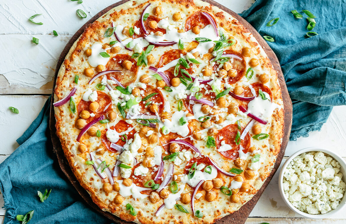 Baked Pepperoni Pizza Topped with chickpeas, onions and more