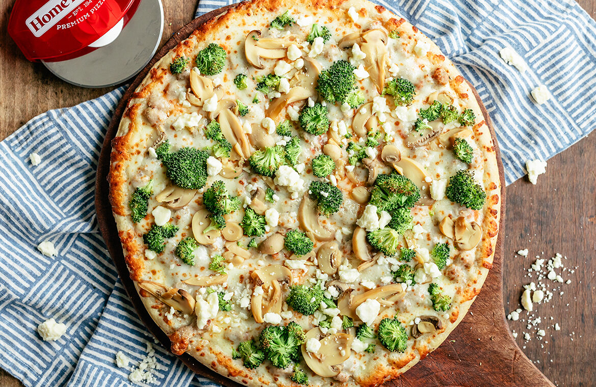 Baked pizza topped with recipe ingredients