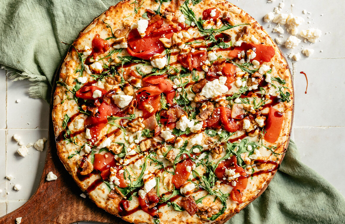 Baked home run inn pizza topped with recipe ingredients