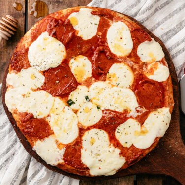 Baked pizza topped with ingredients from recipe