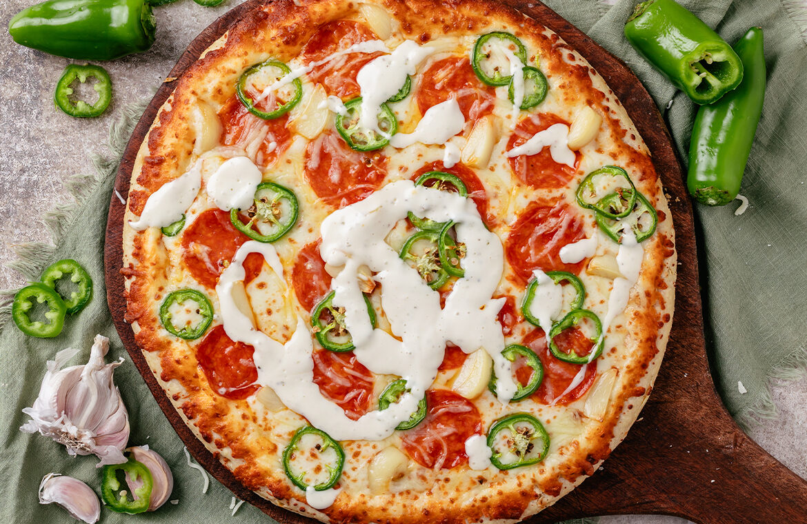 Baked pizza with recipe ingredients on top