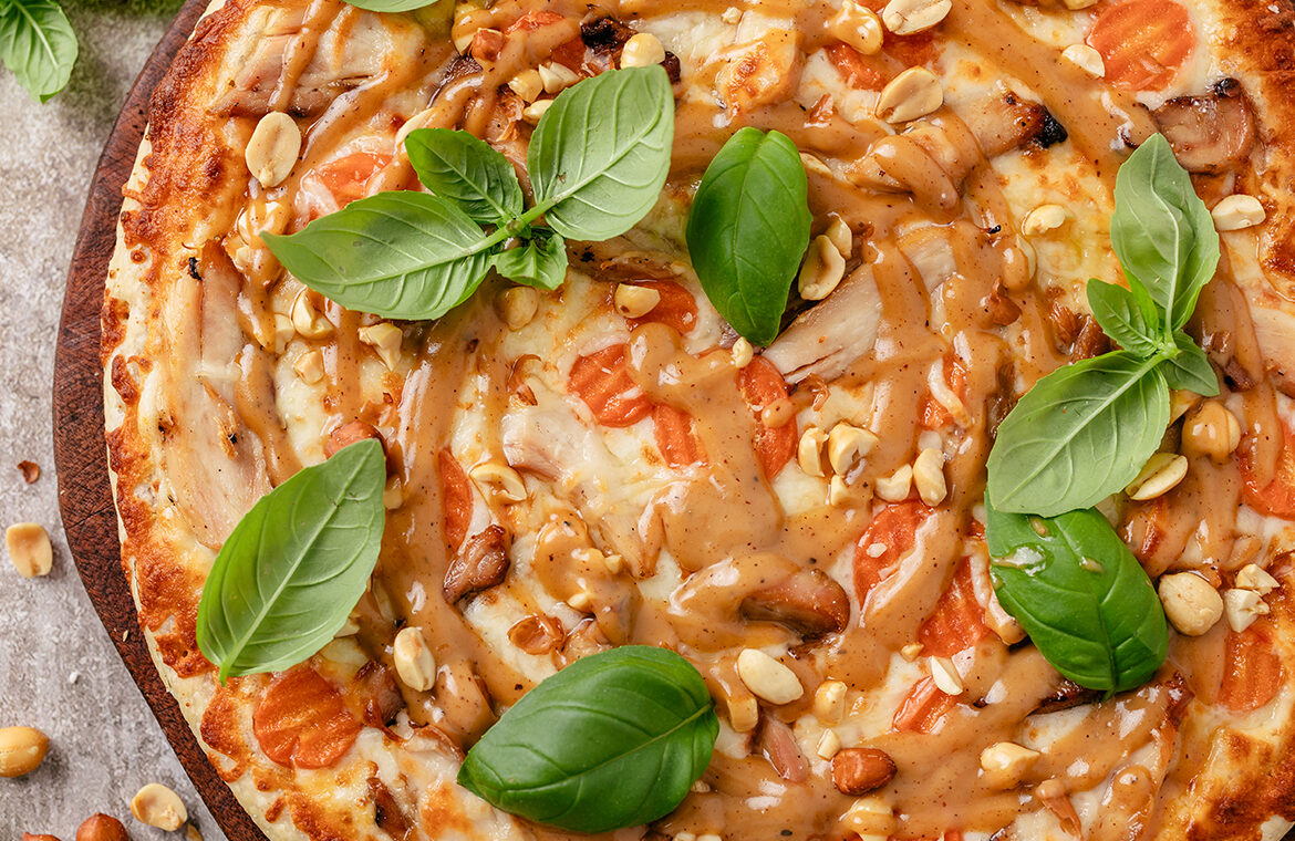 Baked pizza with recipe ingredients on top