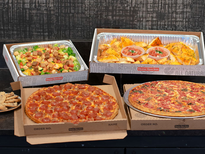 Game day feast with pizza and pasta and salad to feed 10-15 people
