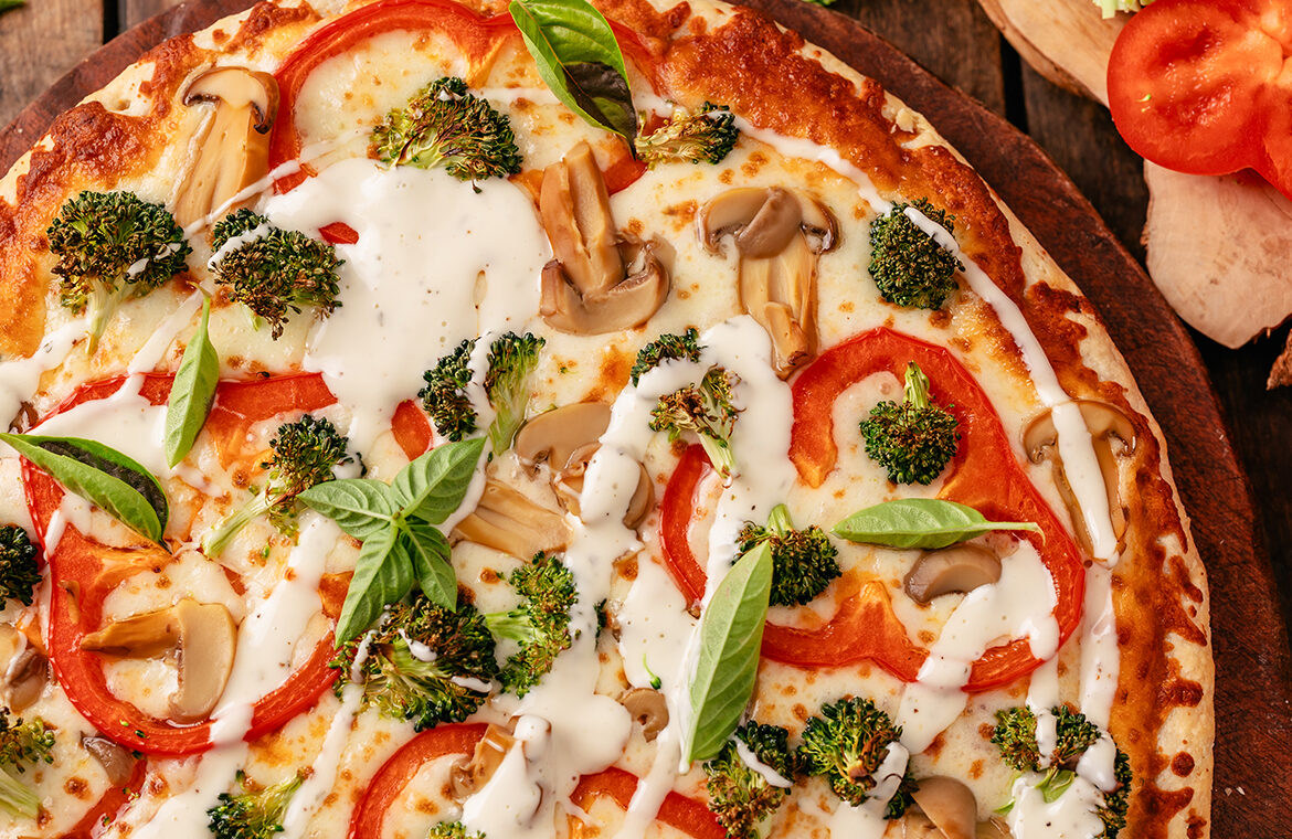 Baked Home Run Inn Pizza with recipe ingredients on top